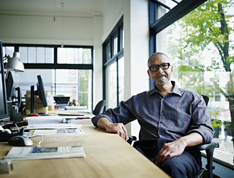 A payroll administrator at their desk